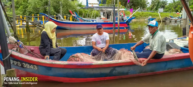 fishermen at sungai pinang balik pulau