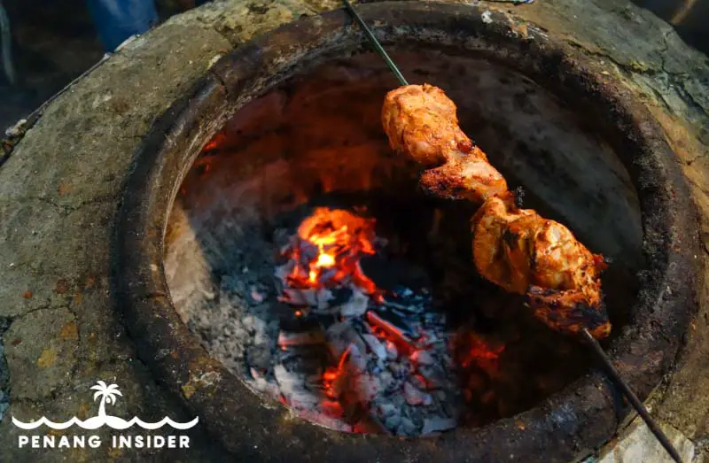 Pure Pakistani tandoori oven cooking chicken skewer in Taiping