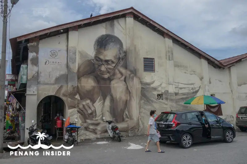 The Old Fisherman by Julia Volchkova spruces up the wall of a shophouse in the center of Balik Pulau