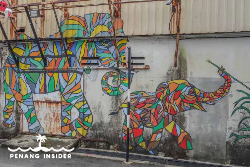 rainbow coloured mural art of elephants in Butterworth Art Walk, Malaysia