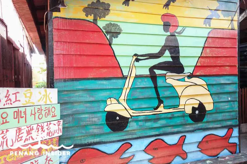 Chew Jetty mural woman on vespa