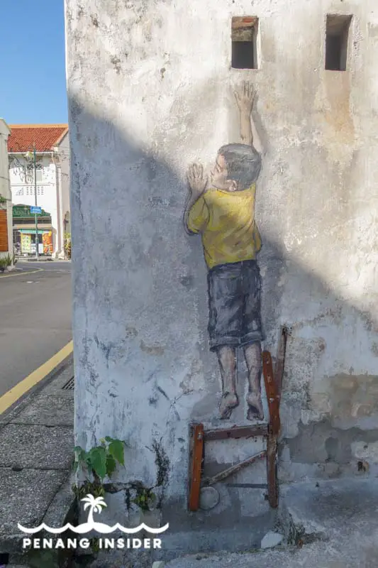 Penang Street Art Boy on the Chair
