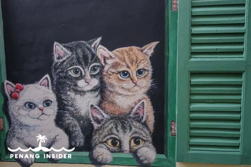 Penang Street Art four cats at the green window