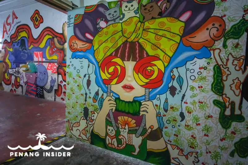 Colorful murals on the inside of Art Lane in George Town Penang