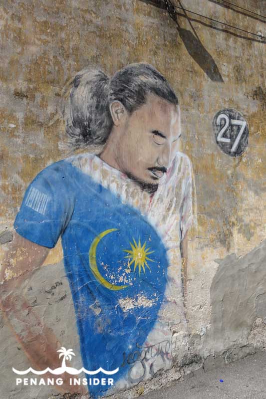 Penang Street Art Man in a Malaysia Shirt