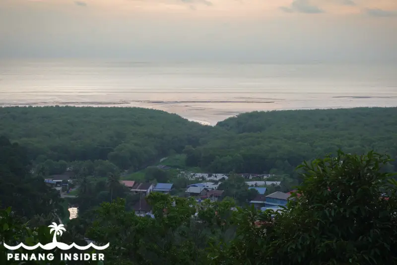 coast of Pantai Acheh and the village seen at sunset in Balik Pulau