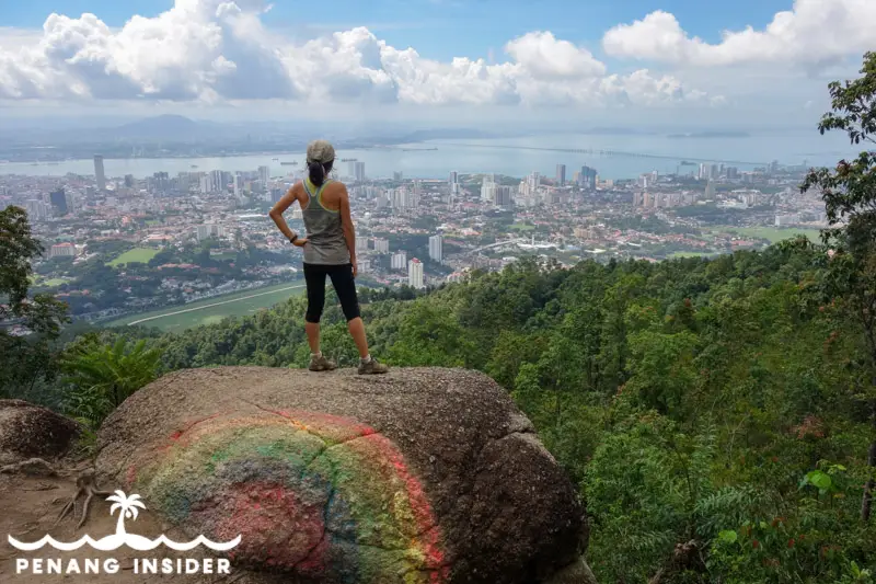 Kit Yeng Chan standing atop Bukit Cendana Rainbow Rock Penang Hill