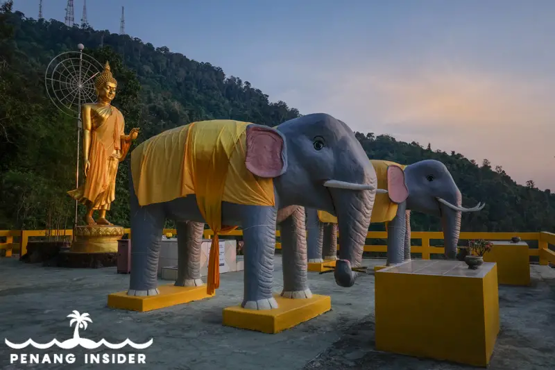 Berapit Buddhist temple Buddha and elephant statues