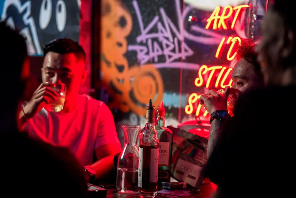 patrons drinking beer at Garage Music & Bar in Penang