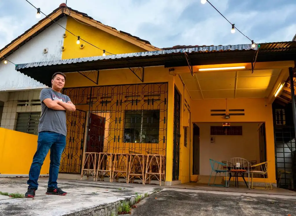 Andy stands in front of Taps Beer Bar Penang in Tanjung Bungah
