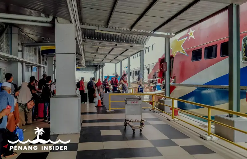 passengers at Kuala Perlis board the ferry to Langkawi island