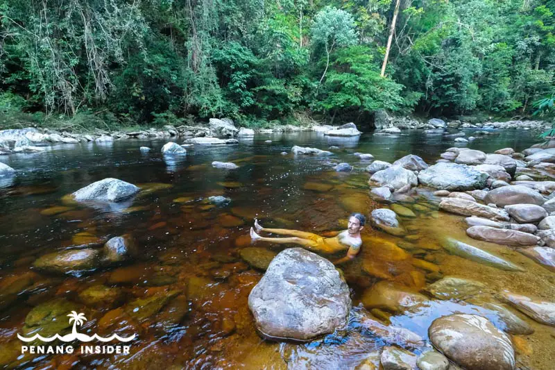 Taking a bath at Kem Kor after summiting Gunung Tahan