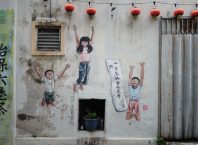 Street art of kids jumping in Market Lane, Ipoh, Perak