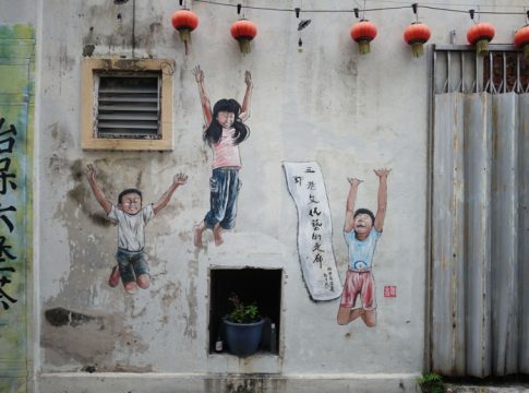 Street art of kids jumping in Market Lane, Ipoh, Perak