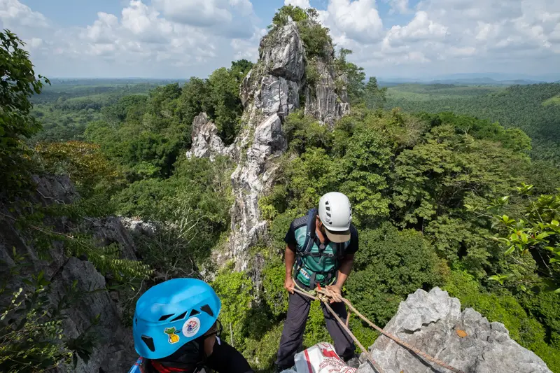 Abseiling from Paya Gunung Tower A