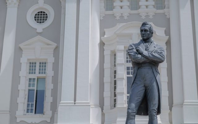 Sir Stamford Raffles' statue watches over Singapore's Civic District